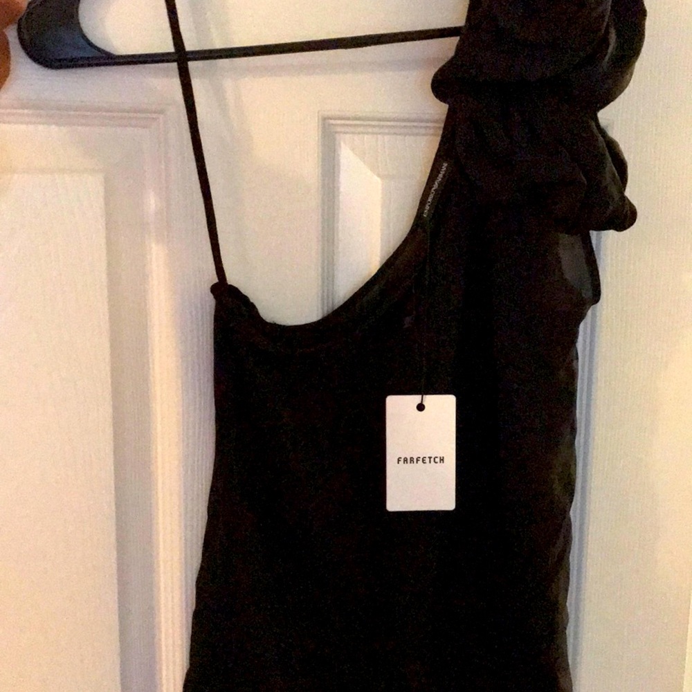 Black off-shoulder blouse.
